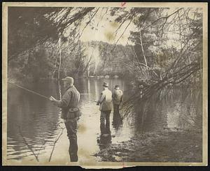 New Hampshire Fish and Game Photo -- Uel Gardner. Governor John W. King and friends are up at daybreak on opening day to fish a favorite trout brook.