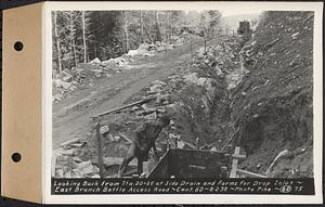 Contract No. 60, Access Roads to Shaft 12, Quabbin Aqueduct, Hardwick and Greenwich, looking back from Sta. 20+25 at side drain and forms for drop inlet, Greenwich and Hardwick, Mass., Aug. 2, 1938