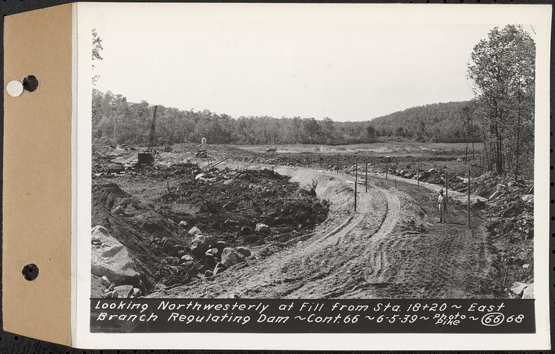 Contract No. 66, Regulating Dams, Middle Branch (New Salem), and East Branch of the Swift River, Hardwick and Petersham (formerly Dana), looking northwesterly at fill from Sta. 18+20, east branch regulating dam, Hardwick, Mass., Jun. 5, 1939