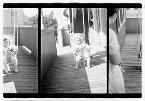 Child in a swing seat