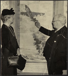 Helen Coolidge standing with gentleman in bow tie
