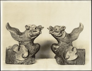 Two Chinese dragon heads, glazed porcelain