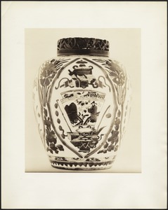 Hand-painted Chinese porcelain container with carved lid