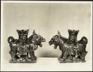 Chinese porcelain lions, possibly candlestick holders