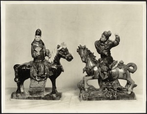 Chinese porcelain figures on horseback, one holding fan