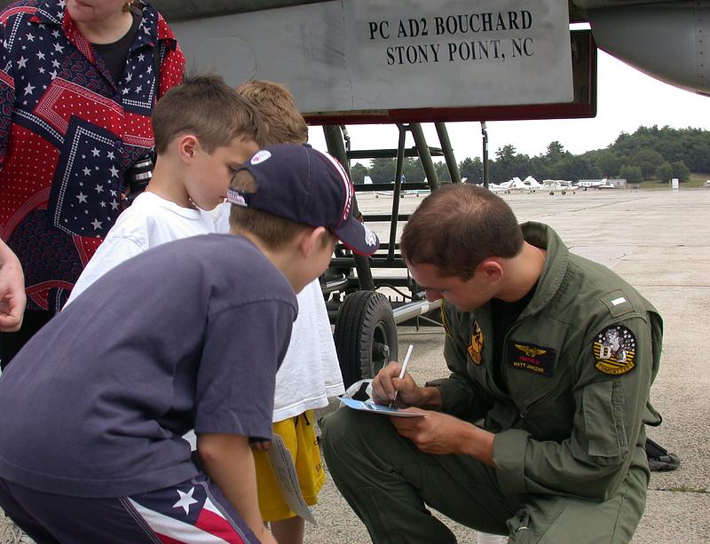 F-14 Navy pilot visits with patients and their families