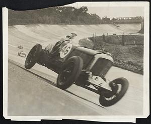 An unsupercharged Bentley car, driven by Jack Dunfee and Cyril Paul, stunned the auto racing world when it attained speeds of upwards of 120 miles an hour en route to winning the 500-mile race at Brooklands England, October 3, 1931.