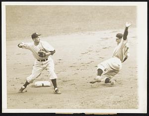 Out at second -- First baseman Frank McCormick of the Reds was forced out at second base in the first inning of the World Series at New York, Joe Gordon making the out at second and throwing to Babe Dahlgren at first base, putting out Lombardi, for the double play