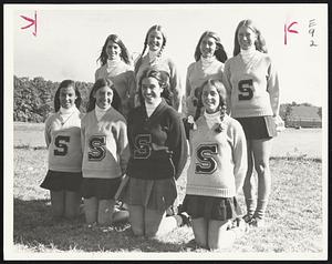 Bishop Stang Cheerleaders – Front, from left, Marguerite Rousseau, Sheila Kearney, Linda Naney, Jeanne Boyer; rear, Carol Small, Pat Kearney, Mary Lou Brown, Corliss Burke.