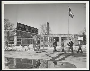 Token Picket Force. A token picketing force of five men were on duty at one of the gates of the strike closed Hayward-Schuster Woolen Mills at East Douglas, Mass., February 26th. The few pickets who patrolled the entrances of the mill had virtually nothing to do as both management and employees refused to yield to demands. Winfield Schuster, company president, closed the mills and said he wouldn't open during the strike. Both sides expect to confer at the State House with Massachusetts Labor Commissioner John J. Delmonte Wednesday.