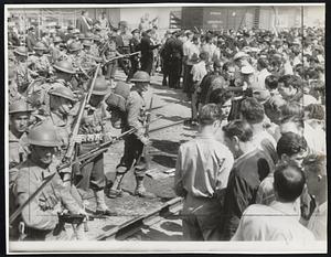 Pickets Give Way Before Bayonets - Entrances to North American Aviation plant in Inglewood, Cal., are cleared by U.S. soldiers.