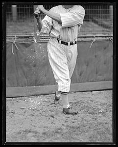 Unidentified baseball player holding a bat