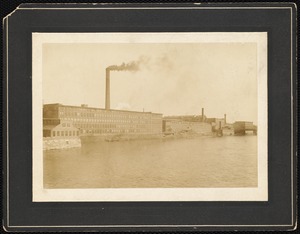 View of a mill across a river