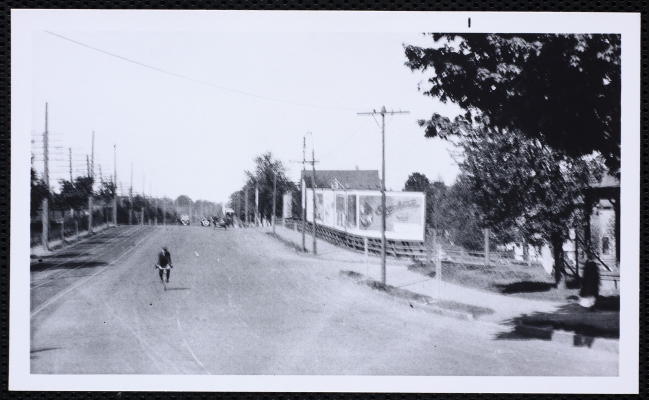 Houses. Newton, MA. Man on bike