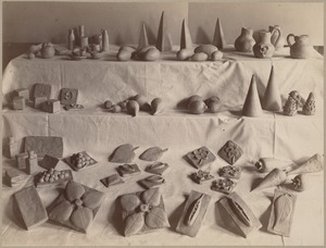 Many examples of clay models: Pitchers, acorns, leaves, carrots, etc.
