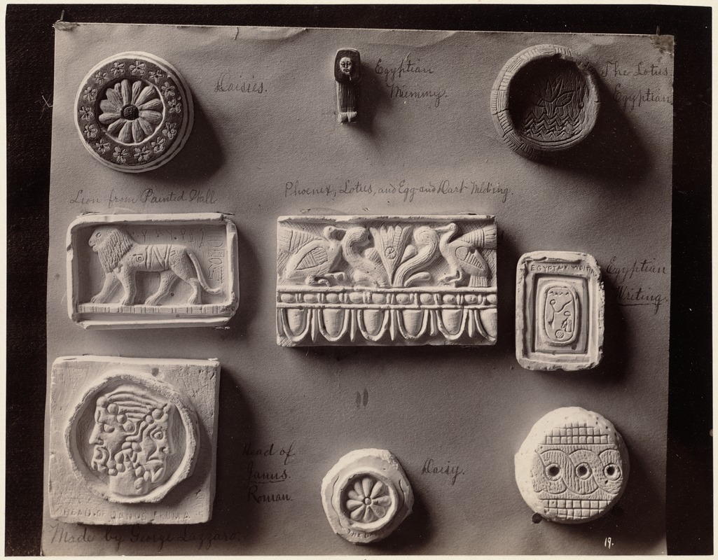 Nine small examples of modeling: Daisies, Egyptian mummy, the lotus Egyptian, lion from painted hall, phoenix, lotus, and egg and dart molding, Egyptian writing, head of Jannus Roman, daisy & rope design