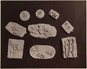 Nine examples of clay modelling from a kindergarten