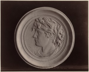Oval disc - head of a woman - model