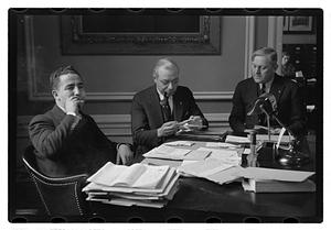 A man seated at a desk