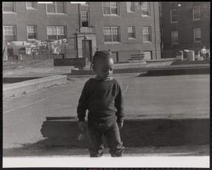 Boy outside Newtowne Court