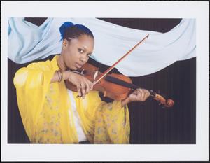 Young woman playing the violin