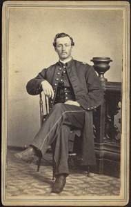 Man in military dress, sitting