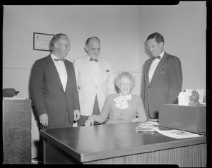Mrs. Frances Fuller Colby at her retirement party, with Selectmen George L. Cross, H. Thomas Murphy and Chairman Victor F. Adams.
