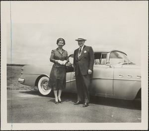 Unidentified couple with automobile, n.d.