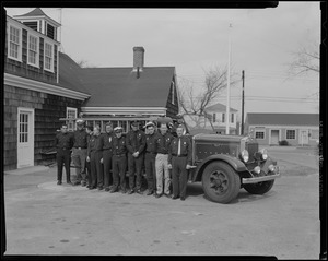 Group of men in uniform with Barnstable Fire District fire truck