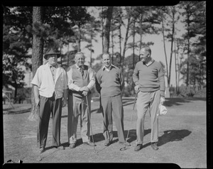 Golfing scene, four men