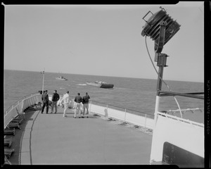 People on deck of large boat