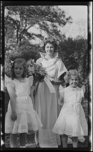 Unidentified woman with two girls