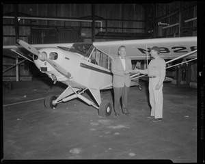 Unidentified men with plane