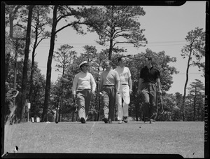 Four men on golf course