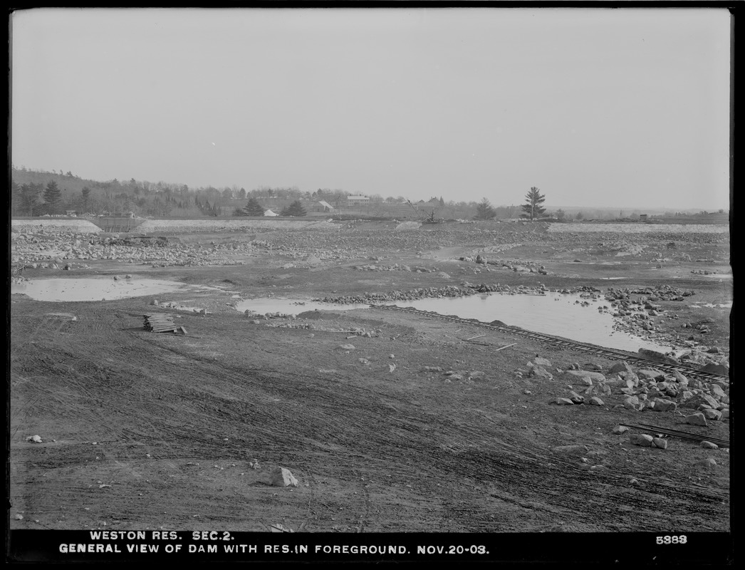 Weston Aqueduct, Weston Reservoir, Section 2, general view of dam with reservoir in foreground, Weston, Mass., Nov. 20, 1903