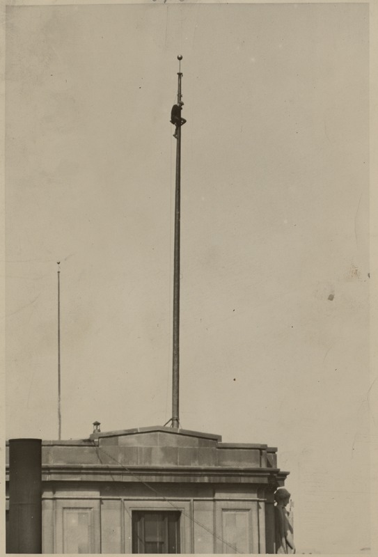 Boston City Hall - man on flagpole