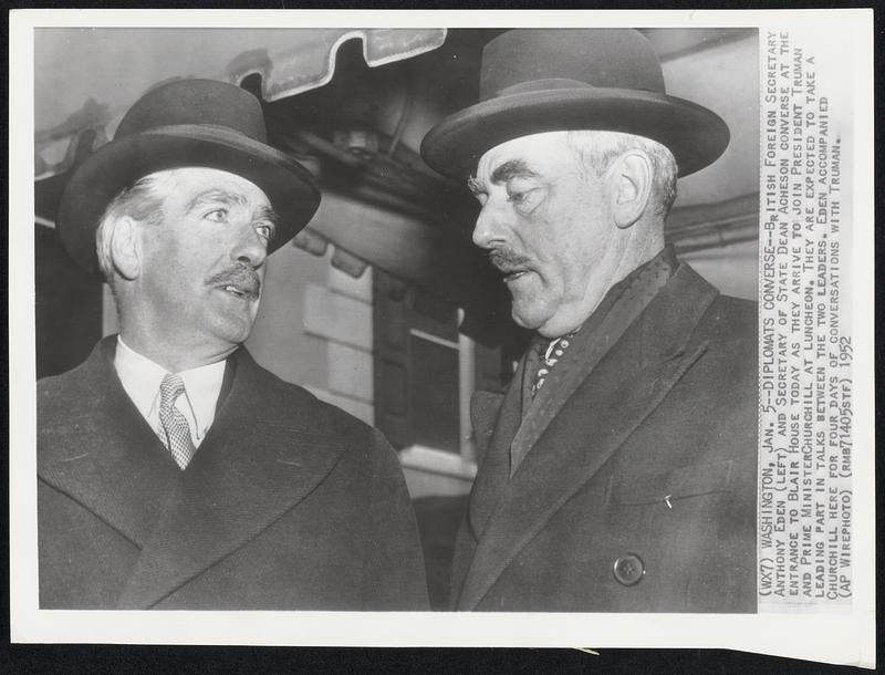 Diplomats Converse--British Foreign Secretary Anthony Eden (left) and Secretary of State Dean Acheson converse at the entrance to Blair House today as they arrive to join President Truman and Prime Minister Churchill at luncheon. They are expected to take a leading part in talks between the two leaders. Eden accompanied Churchill here for four days of conversations with Truman.