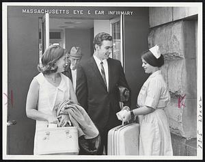 Checking Out of Mass. Eye and Ear Infirmary is California Angel third baseman Paul Schaal, with his wife Julie (left) and nurse Judith Crane. Schaal was hit by Jose Santiago pitch at Fenway June 13.
