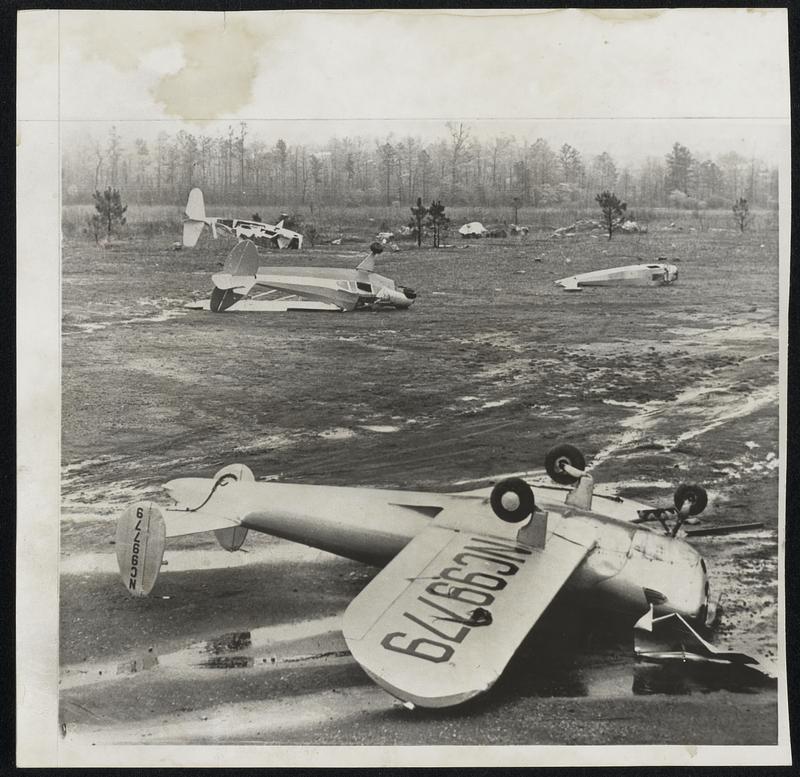 Planes Wrecked by Tornado-These light planes were among 10 smashed by a tornado which struck a small airport in Alabama.