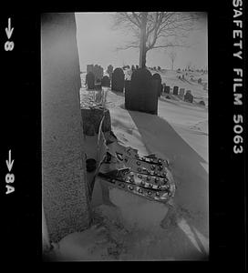 Headstones covered in snow