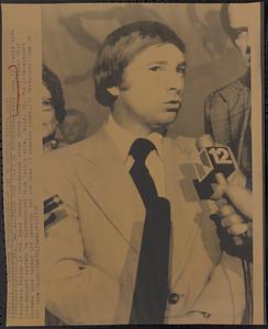 Jerry Cain talks to reporters