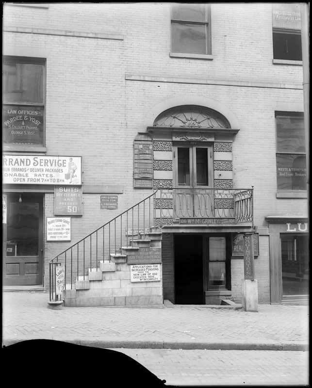 Baltimore, Maryland, 104 East Lexington Street, exterior detail, door and iron rail