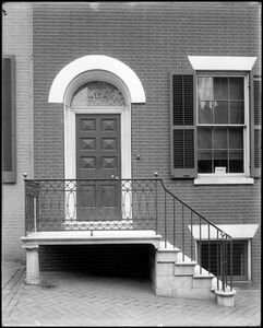Baltimore, Maryland, East Pleasant Street, exterior detail, door and railing, unknown house