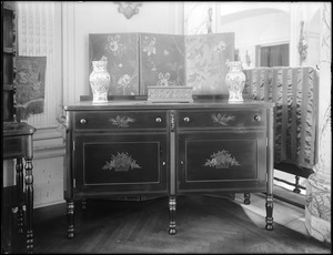 Objects, furniture, black sideboard with floral decoration
