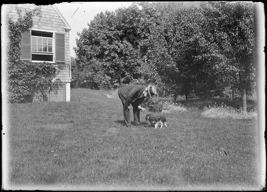 Charles W. Parker with dog, Marblehead, MA