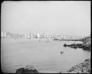View across Marblehead Harbor toward Abbot Hall with many schooners and others with sails up
