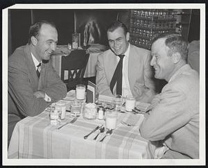 Jovial Buccaneers are Howie Pollet (left), Jim Mangan and George Munger as they enjoy light snack at Hotel Kenmore before facing Braves. The two teams opened two-game series at Wigwam last night.