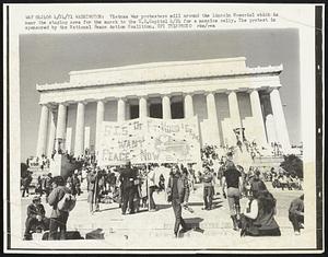 Vietnam War protesters mill around the Lincoln Memorial which is near the staging area for the march to the U.S. Capitol 4/24 for a massive rally. The protest is sponsored by the National Peace Action Coalition.
