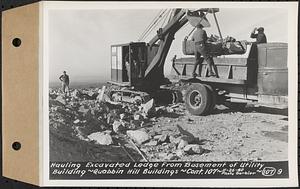 Contract No. 107, Quabbin Hill Recreation Buildings and Road, Ware, hauling excavated ledge from basement of utility building, Ware, Mass., Nov. 26, 1940
