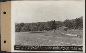 Contract No. 118, Miscellaneous Construction at Winsor Dam and Quabbin Dike, Belchertown, Ware, view of entrance, east access road, showing slanting curb, looking westerly, Ware, Mass., Aug. 17, 1945